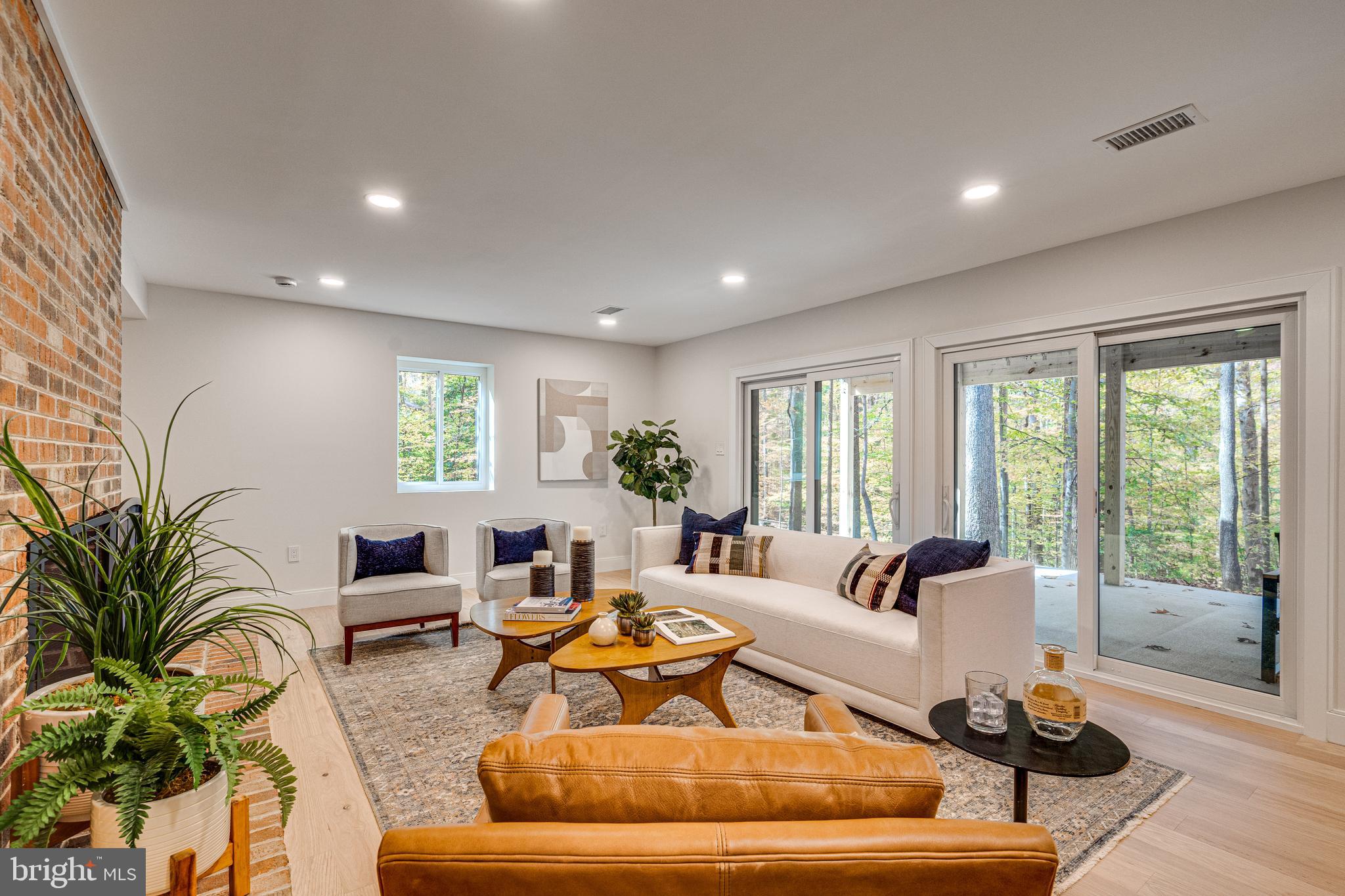 108 Interpromontory Road Great Falls, VA 22066 - Photo 34 of 108 a living room with furniture and a large window