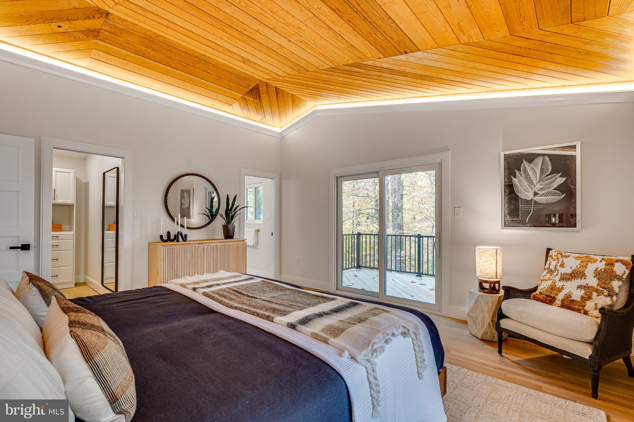 108 Interpromontory Road Great Falls, VA 22066 - Photo 45 of 93 a bedroom with a bed and a window