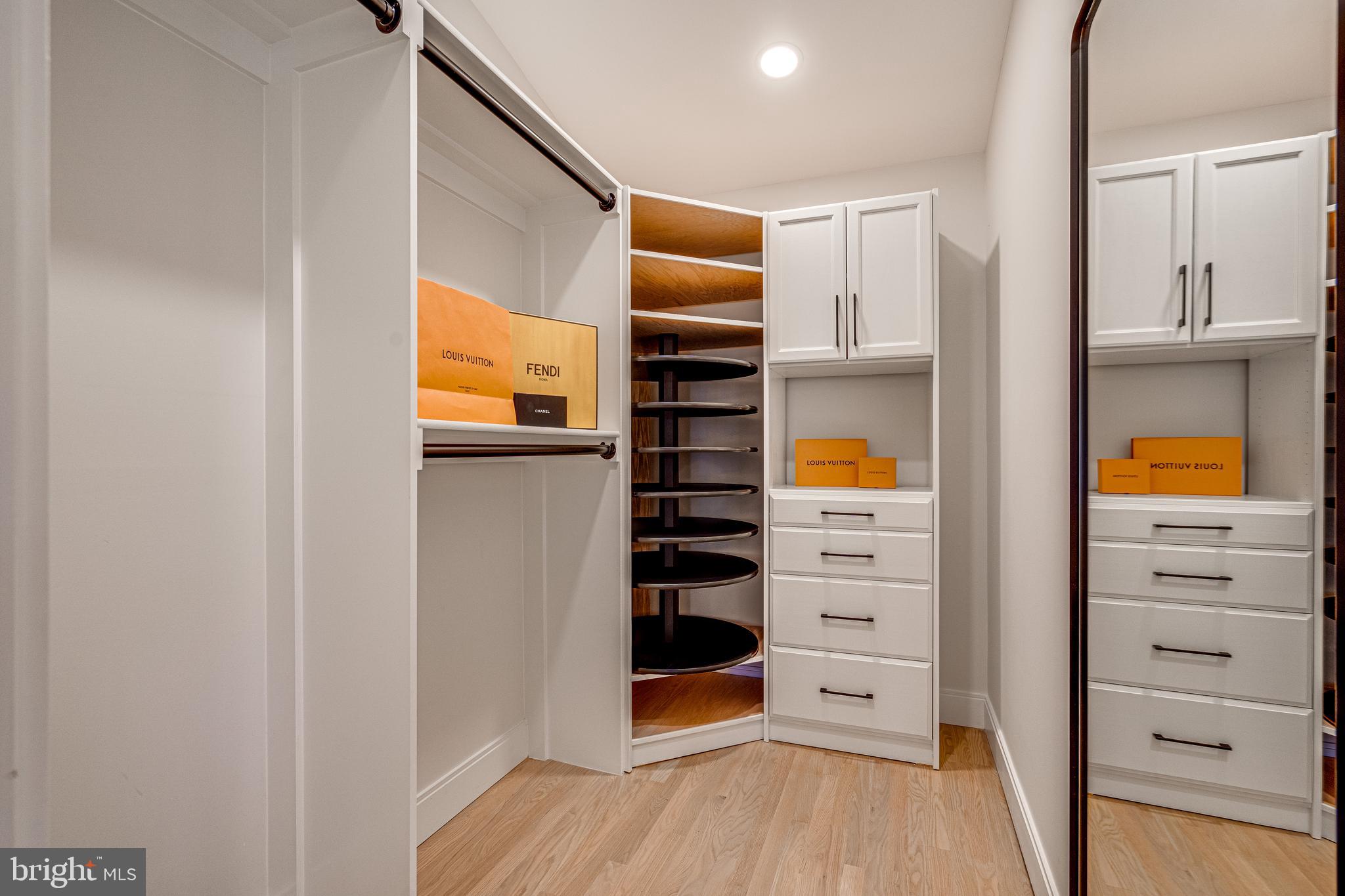 108 Interpromontory Road Great Falls, VA 22066 - Photo 48 of 93 a view of walk in closet with empty racks