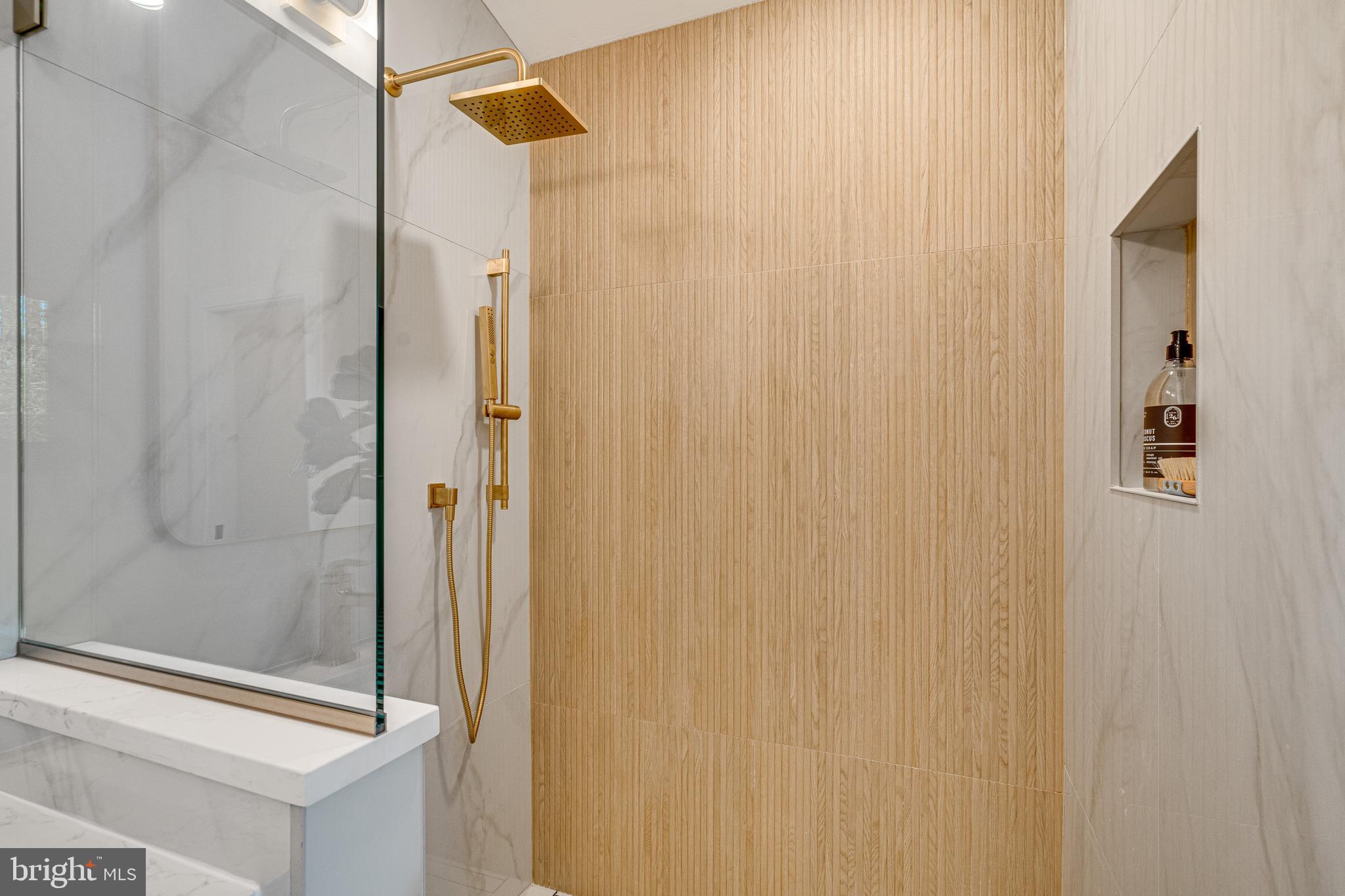 108 Interpromontory Road Great Falls, VA 22066 - Photo 65 of 108 a bathroom with a shower and a sink