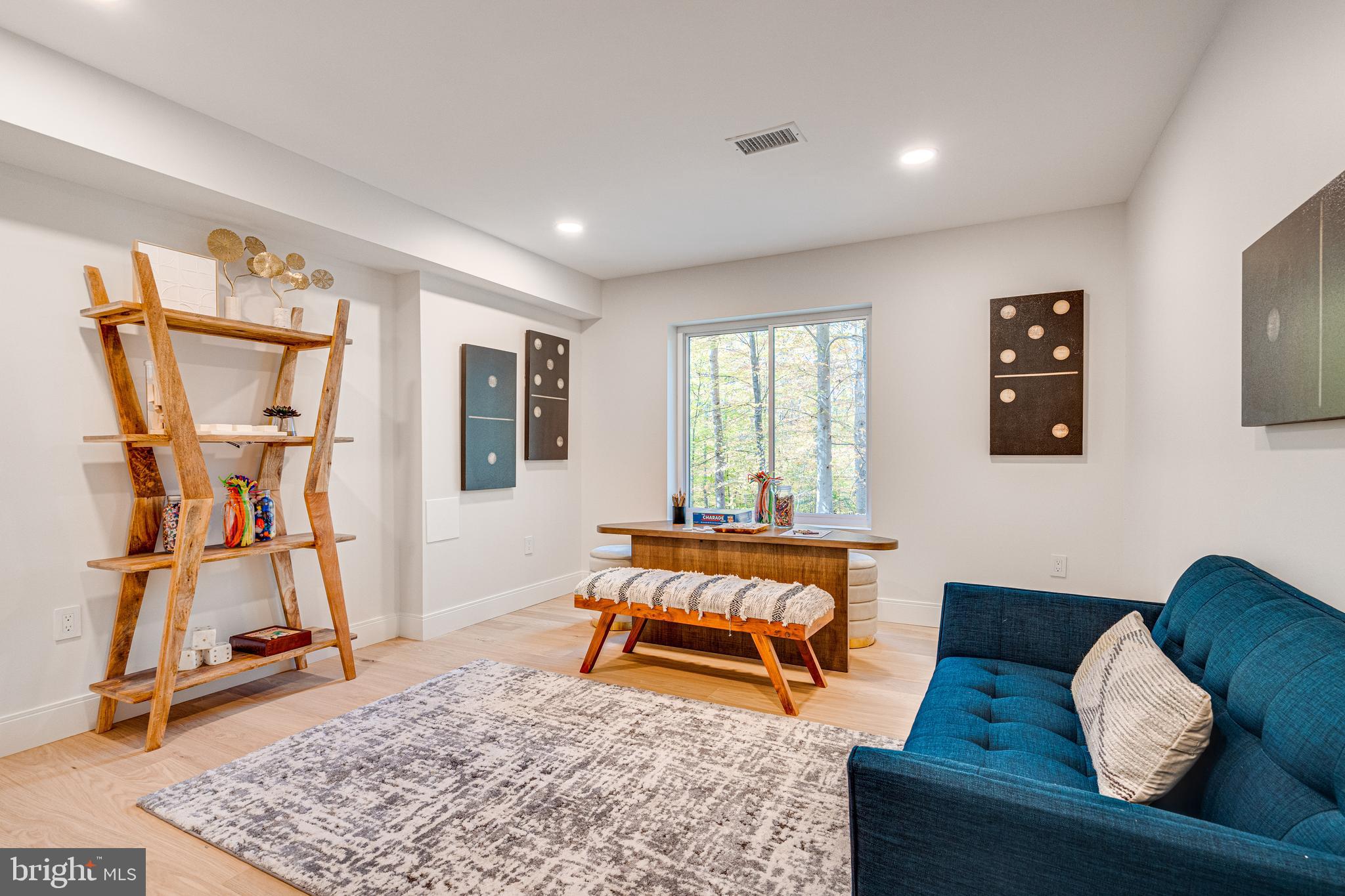 108 Interpromontory Road Great Falls, VA 22066 - Photo 73 of 93 a living room with furniture and a wooden floor