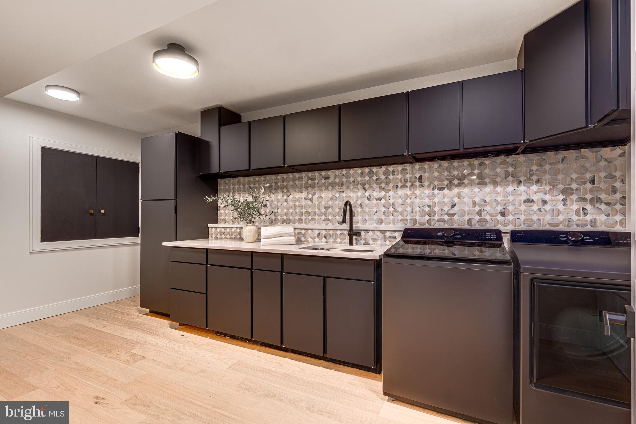 108 Interpromontory Road Great Falls, VA 22066 - Photo 85 of 108 a kitchen with granite countertop cabinets stainless steel appliances and a counter space