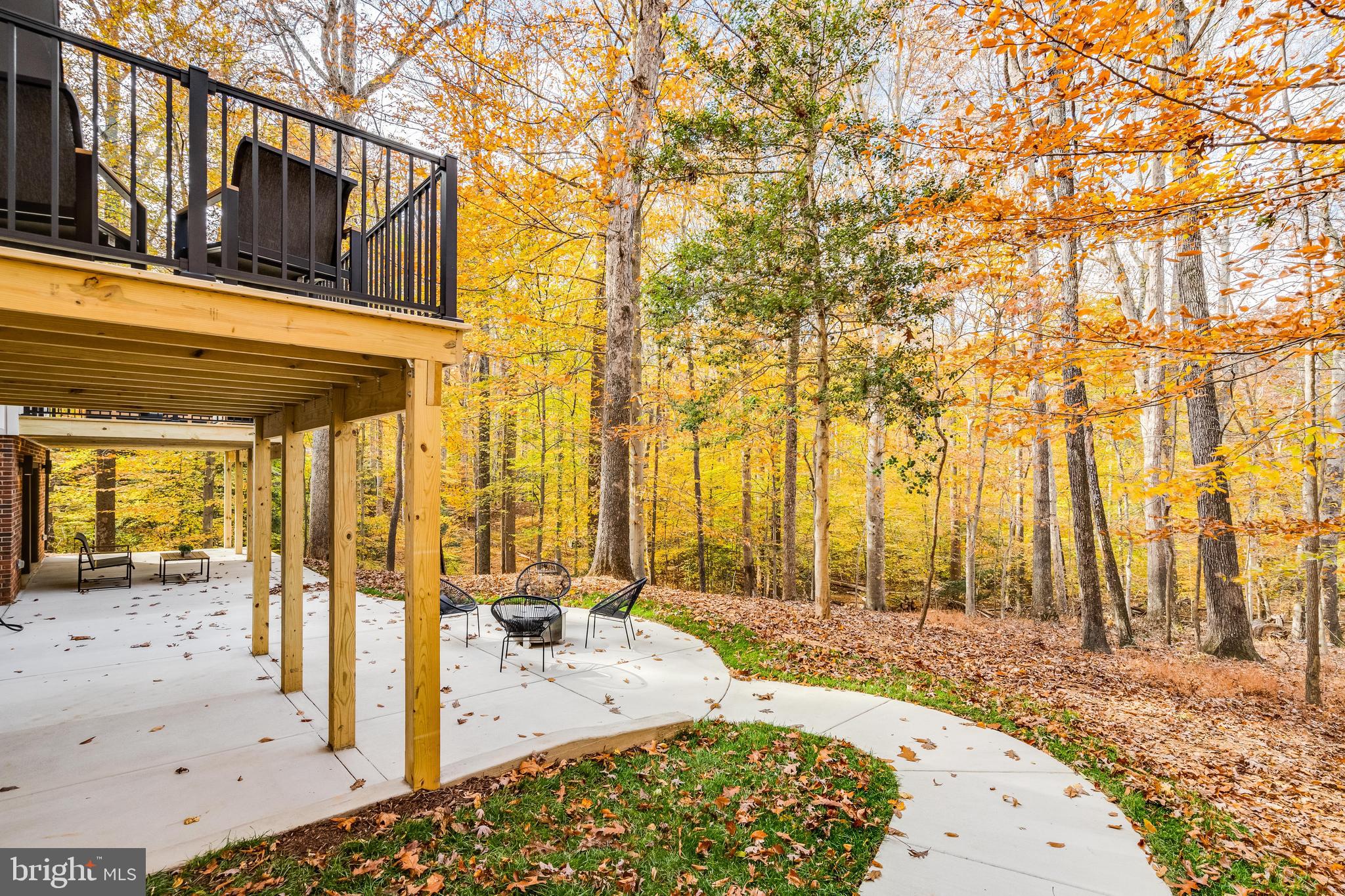 108 Interpromontory Road Great Falls, VA 22066 - Photo 93 of 108 a view of a swimming pool with an outdoor seating