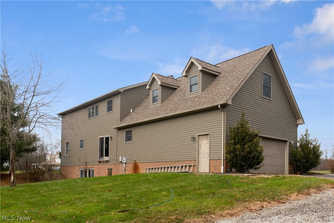 6909 West Calla Road Canfield, OH 44406 - Photo 22 of 25 Side/Garage View