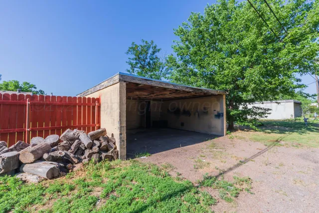 a view of a house with a garden
