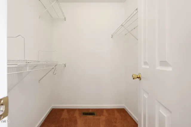 a view of small space with racks on the wall