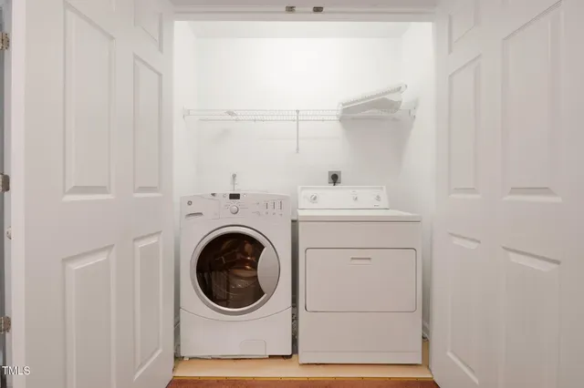 a utility room with dryer and washer