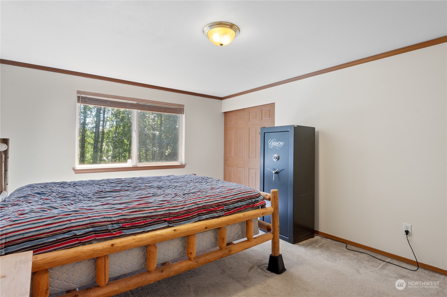 170 Beauvais Road Kelso, WA 98626 - Photo 16 of 36 a bedroom with a bed and window