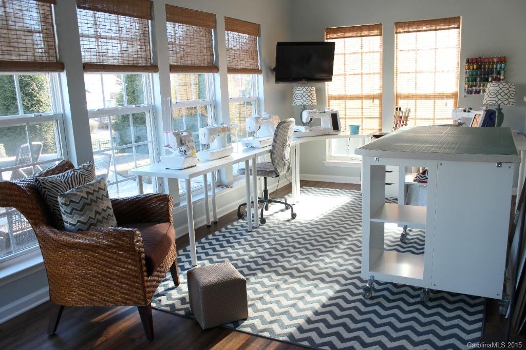 111 Hollyhurst Lane Fort Mill, SC 29708 - Photo 8 of 19 a living room with furniture and a flat screen tv