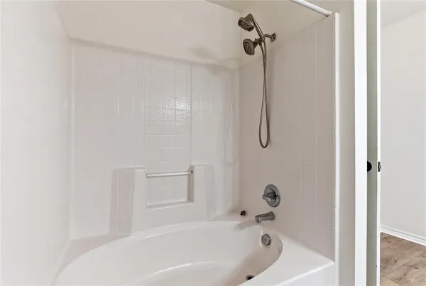a bathroom with a bathtub