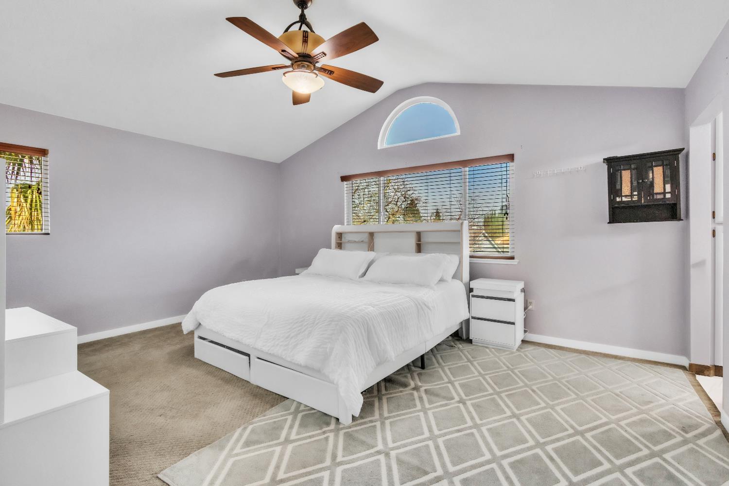 8148 Orchid Tree Way Antelope, CA 95843 - Photo 12 of 33 a bedroom with a bed and a table