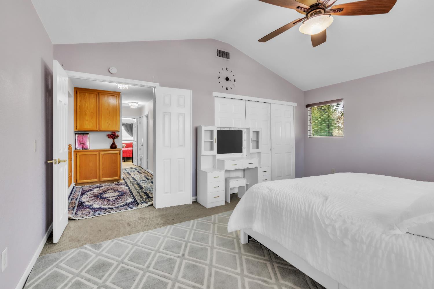 8148 Orchid Tree Way Antelope, CA 95843 - Photo 13 of 33 a bedroom with a bed and flat screen tv