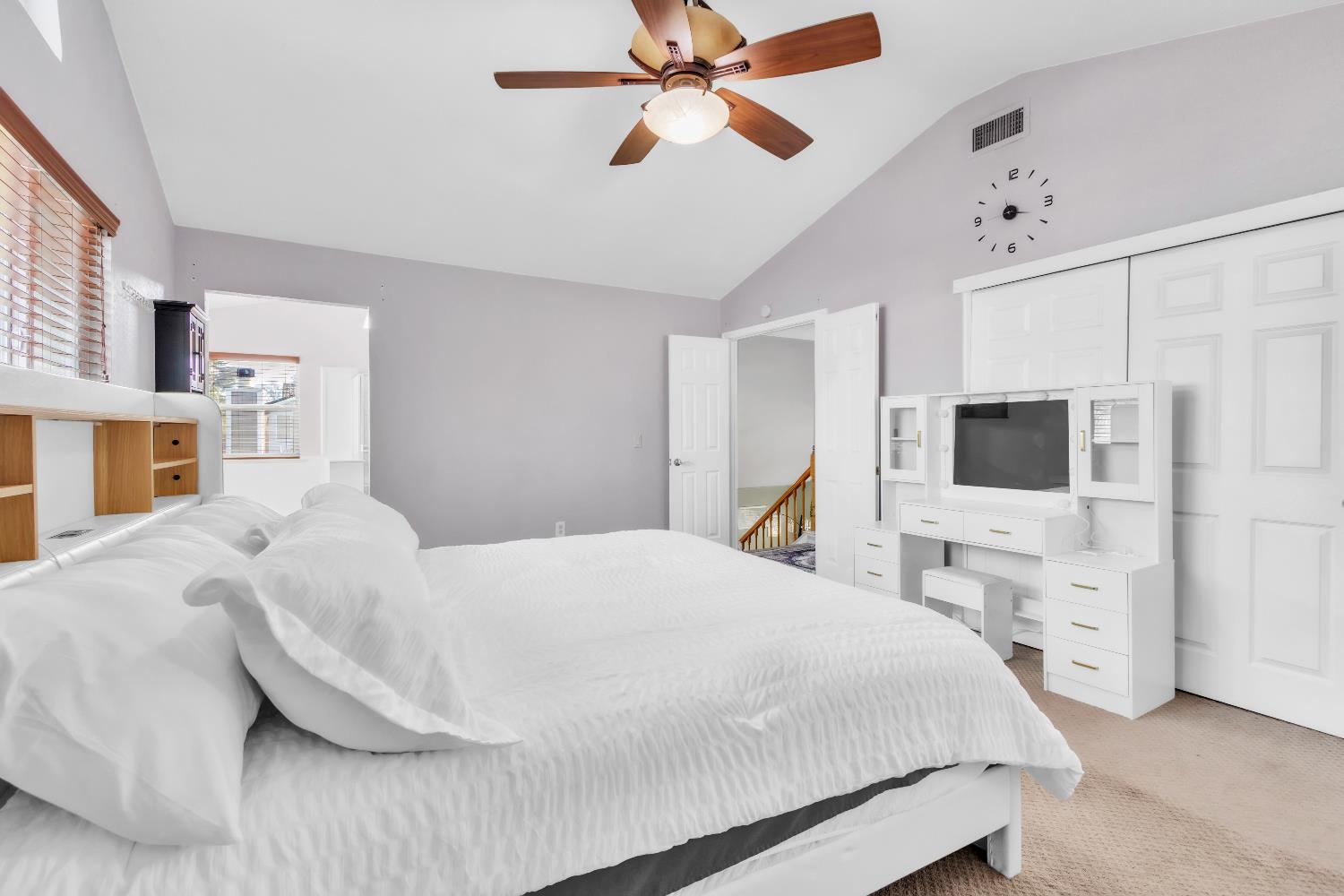 8148 Orchid Tree Way Antelope, CA 95843 - Photo 14 of 33 a bedroom with a bed and a flat screen tv