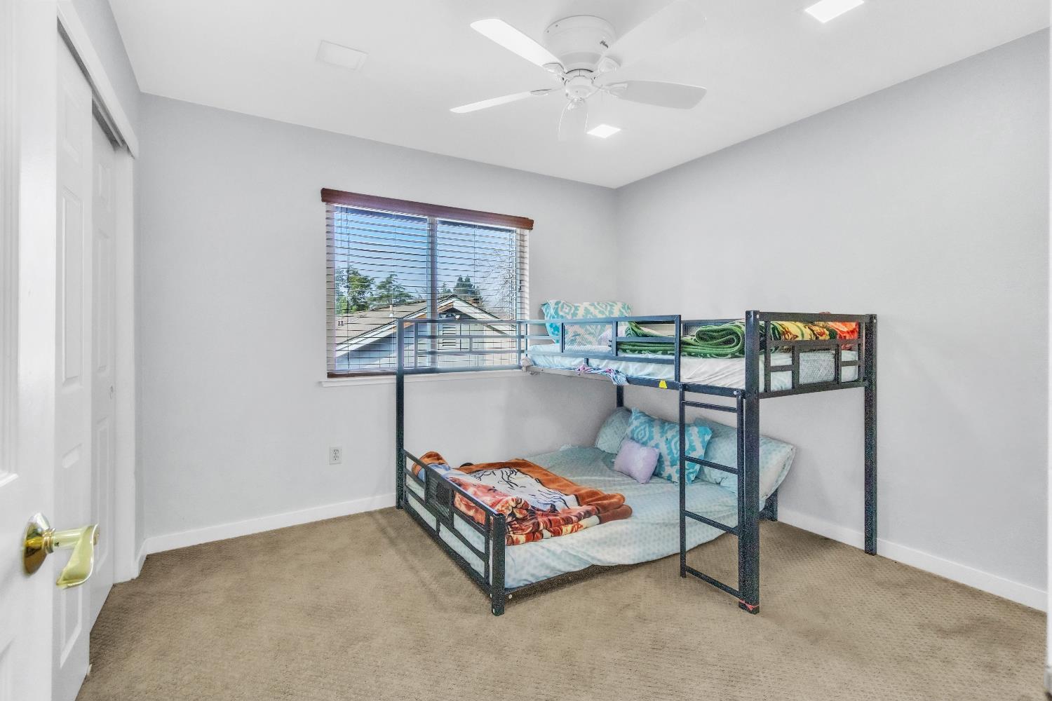 8148 Orchid Tree Way Antelope, CA 95843 - Photo 16 of 33 a living room with furniture and a table