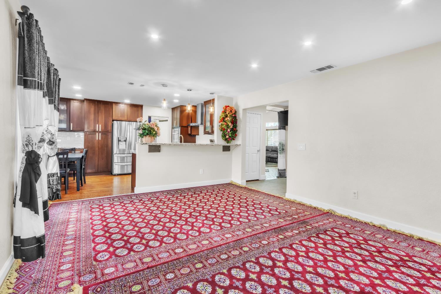 8148 Orchid Tree Way Antelope, CA 95843 - Photo 20 of 33 a bedroom with a bed and a view of living room