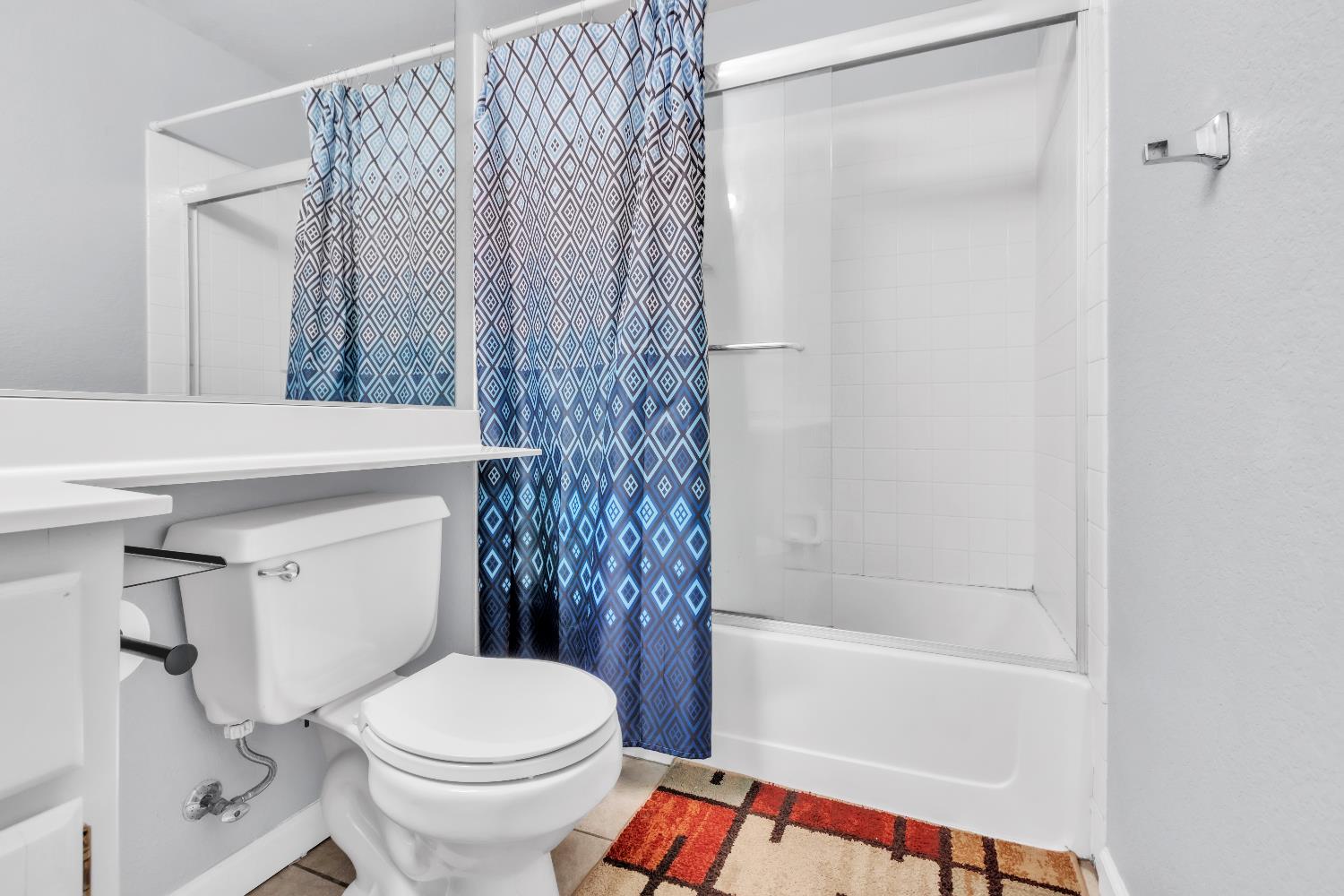 8148 Orchid Tree Way Antelope, CA 95843 - Photo 29 of 33 a bathroom with a toilet and a shower