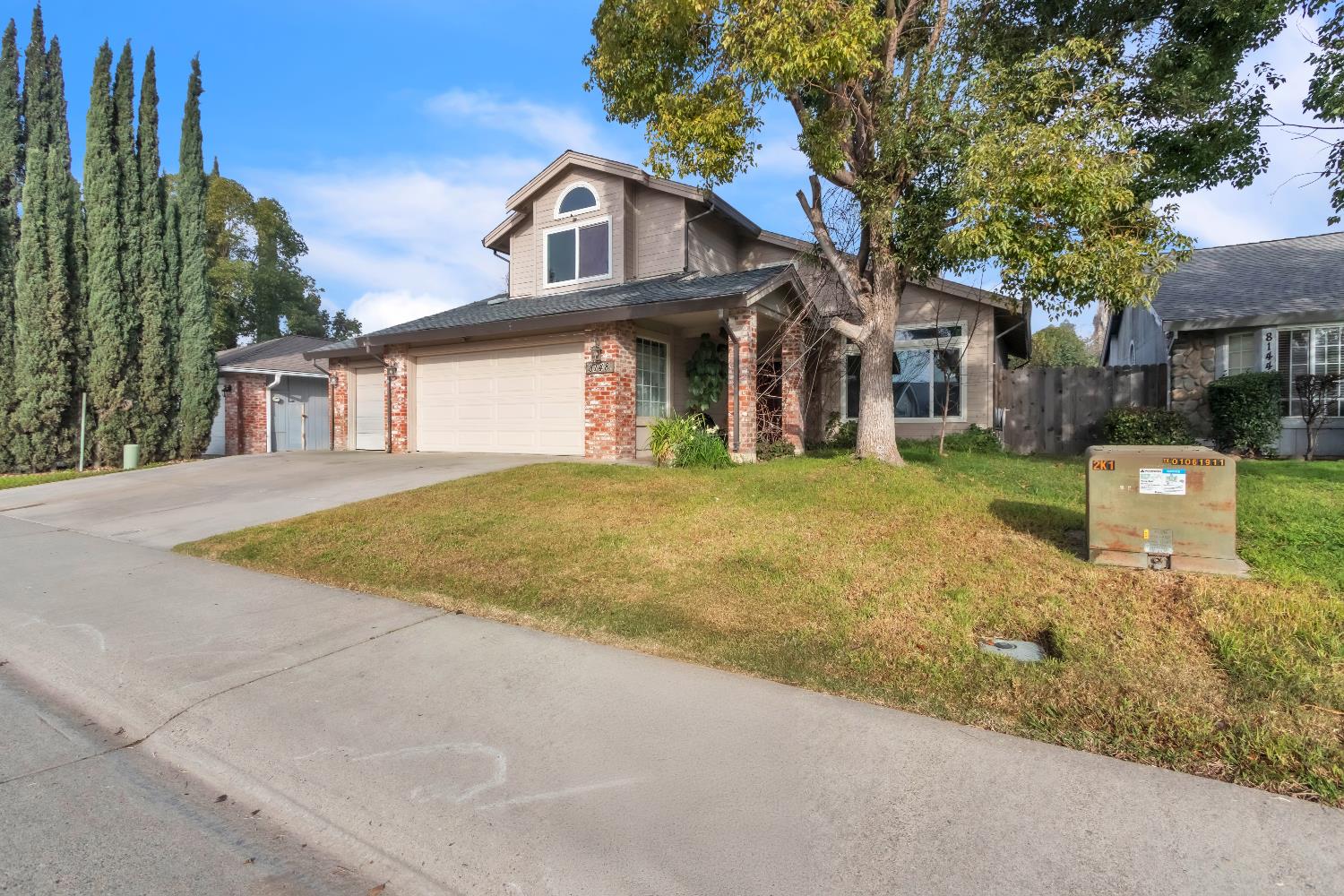 8148 Orchid Tree Way Antelope, CA 95843 - Photo 3 of 33 a front view of a house with a yard