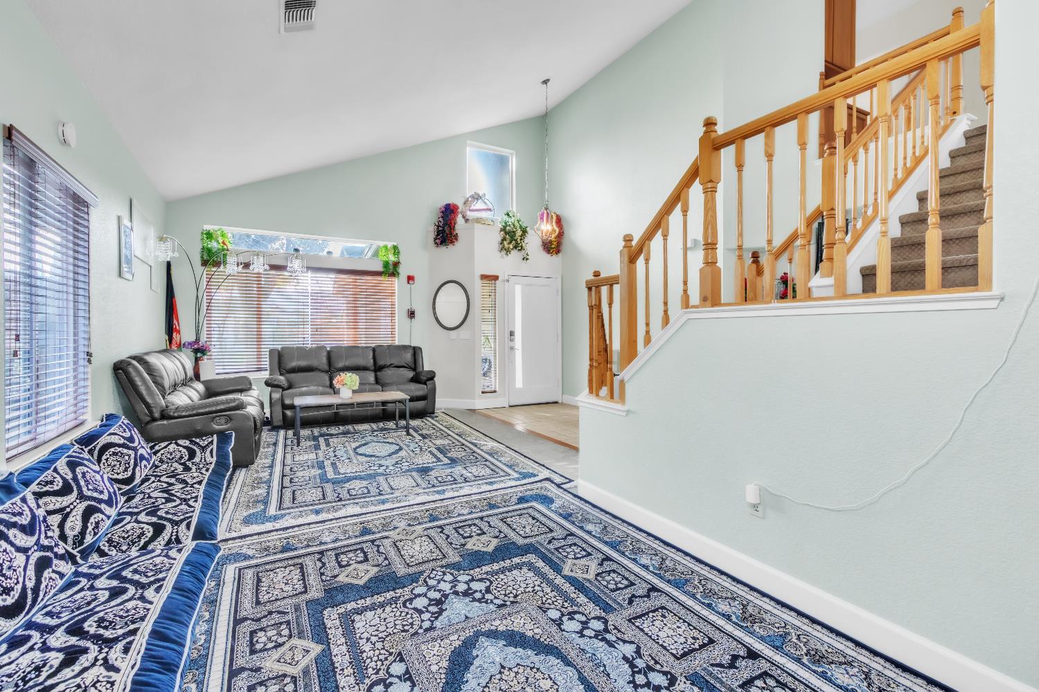 8148 Orchid Tree Way Antelope, CA 95843 - Photo 4 of 33 a living room with furniture and a rug