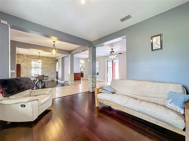 a dining room with furniture window wooden floor