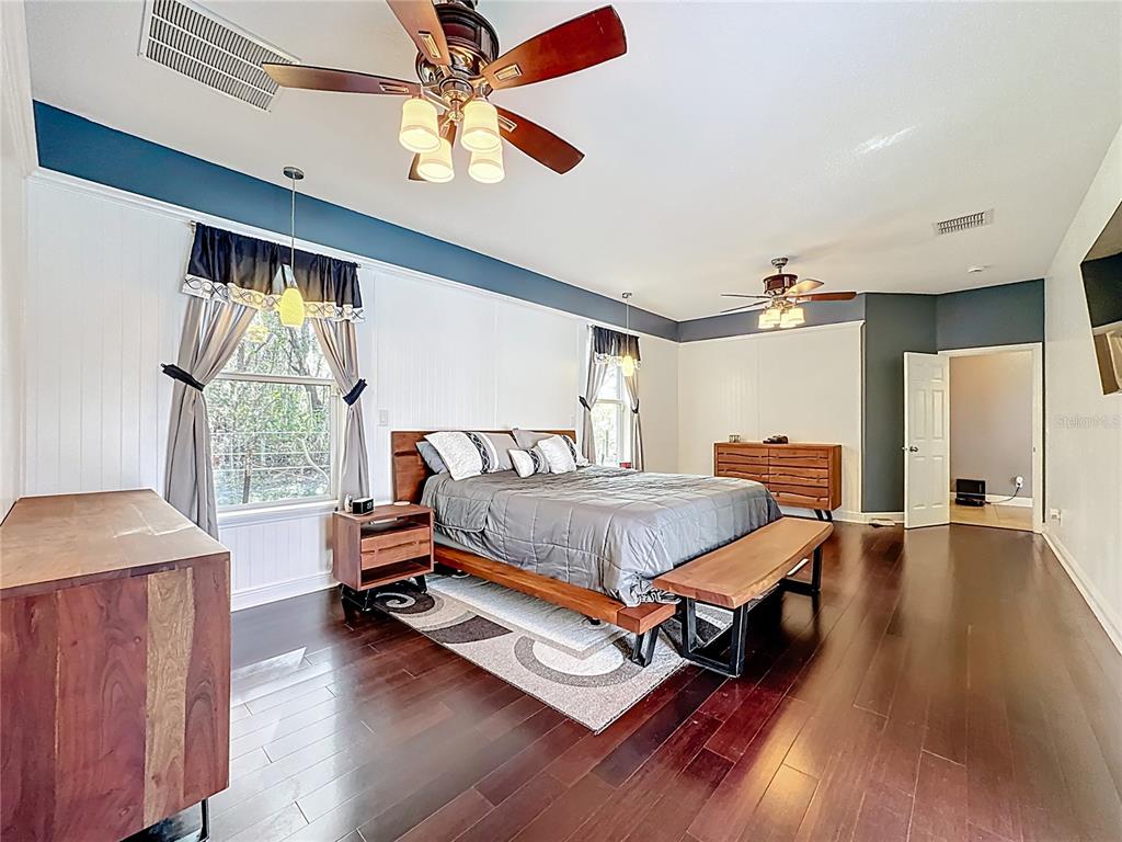 4295 Rambler Avenue St. Cloud, FL 34772 - Photo 35 of 54 a bedroom with a bed and a window