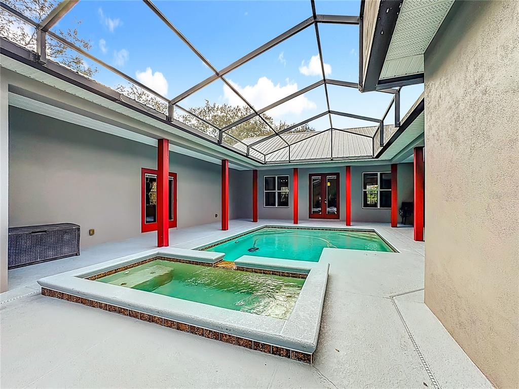 4295 Rambler Avenue St. Cloud, FL 34772 - Photo 43 of 54 a view of swimming pool with a patio