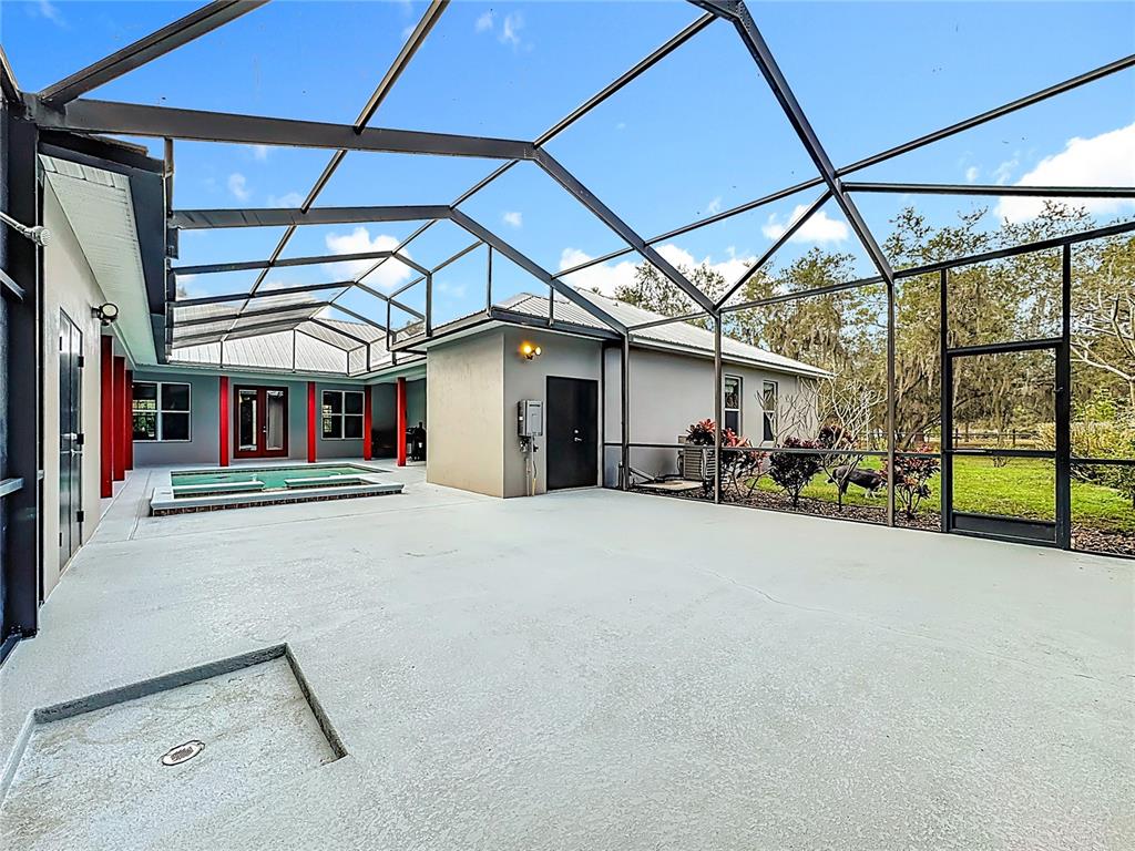 4295 Rambler Avenue St. Cloud, FL 34772 - Photo 46 of 54 a view of a house with a patio
