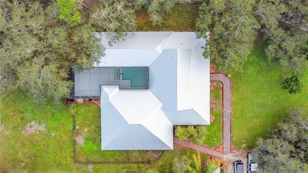 4295 Rambler Avenue St. Cloud, FL 34772 - Photo 51 of 54 an aerial view of a house having yard