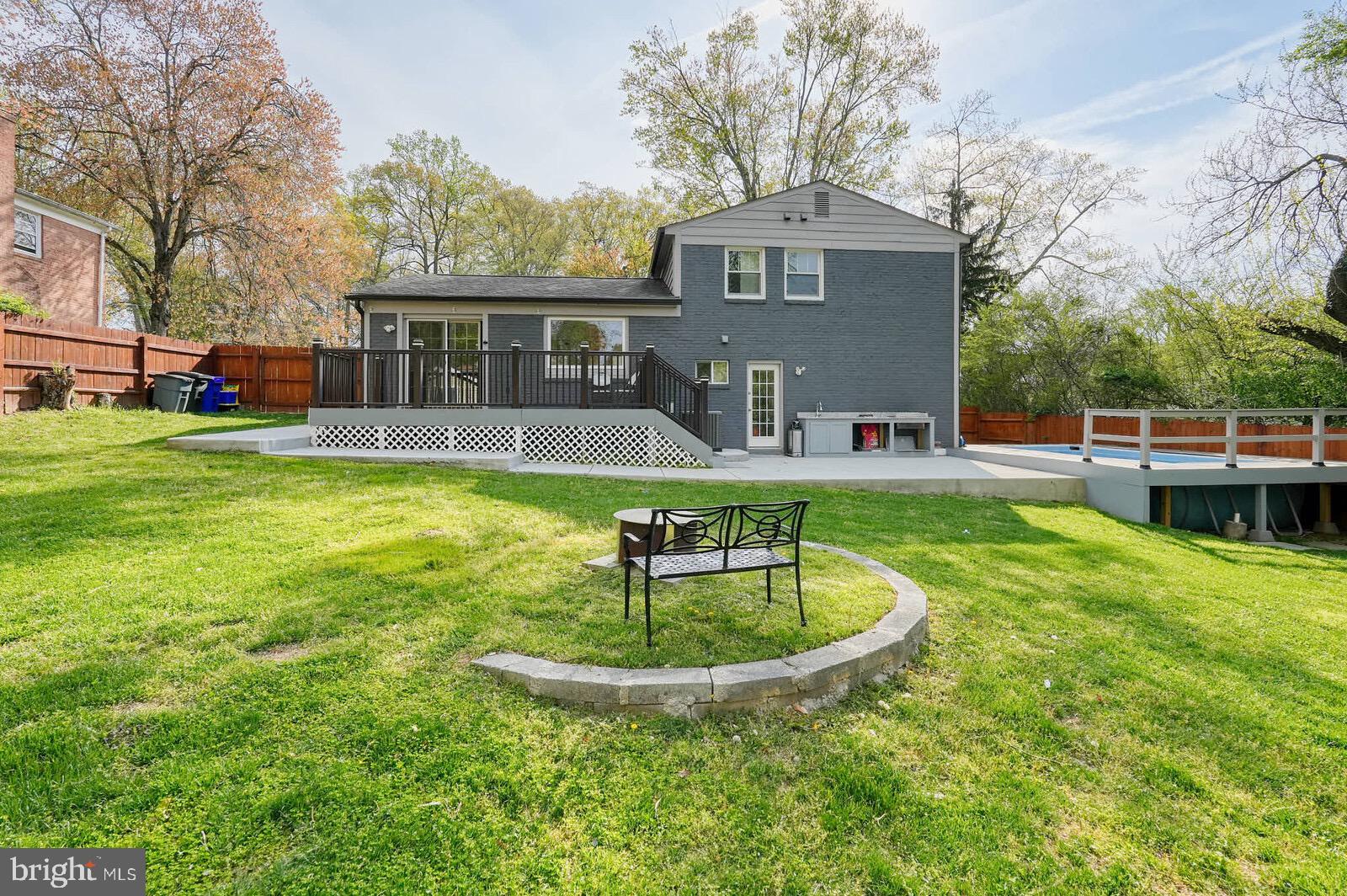 13304 Hathaway Drive Silver Spring, MD 20906 - Photo 20 of 59 a house view with a sitting space and garden view