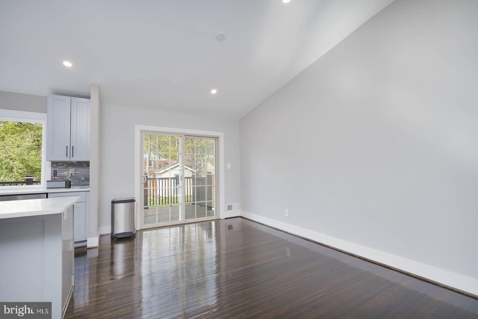 13304 Hathaway Drive Silver Spring, MD 20906 - Photo 32 of 59 a view of wooden floor and windows in a room