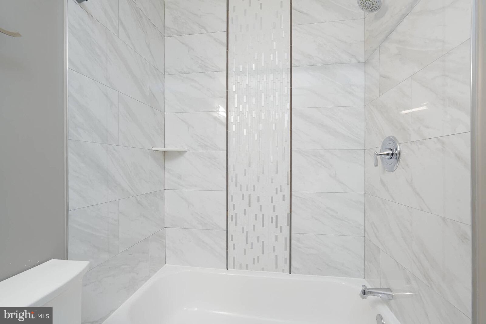 13304 Hathaway Drive Silver Spring, MD 20906 - Photo 51 of 59 a bathroom with a bathtub
