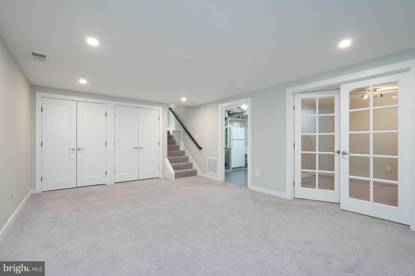 13304 Hathaway Drive Silver Spring, MD 20906 - Photo 57 of 59 an empty room with windows