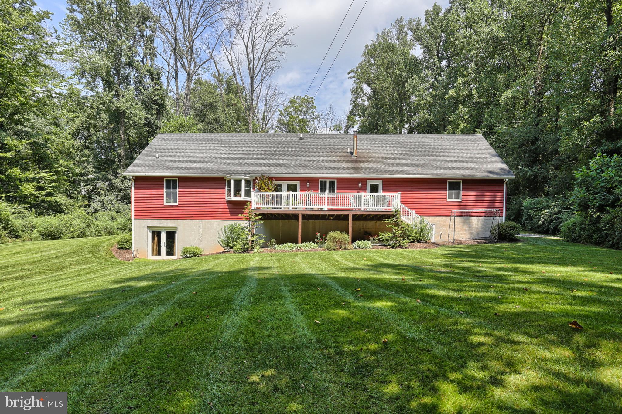 655 Forest Road Denver, PA 17517 - Photo 3 of 66 Rear view, walk out basement, deck