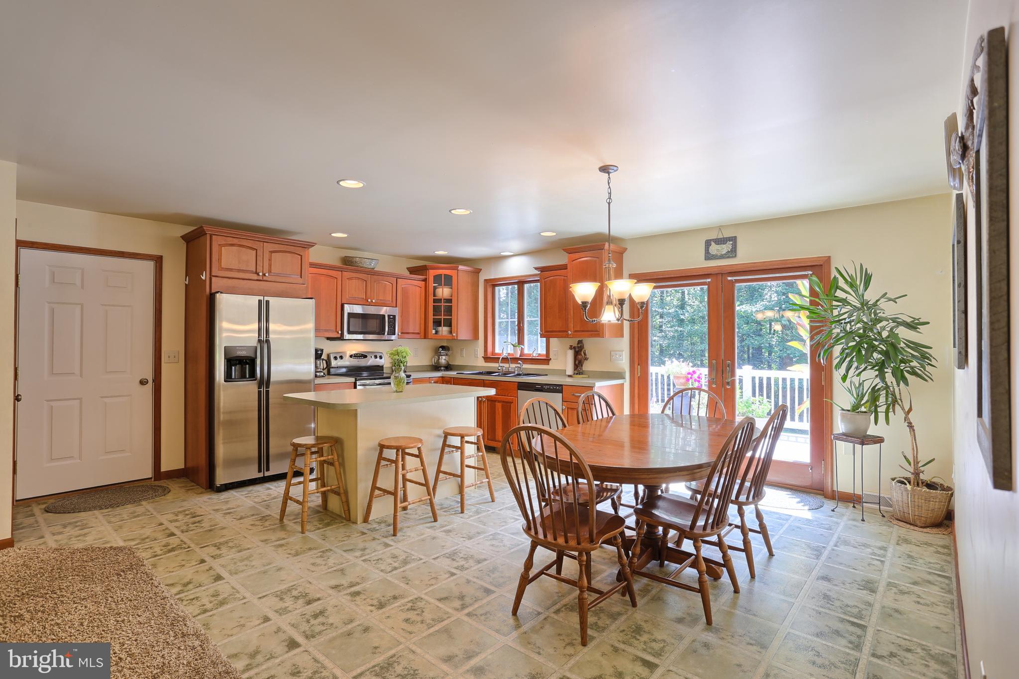655 Forest Road Denver, PA 17517 - Photo 6 of 66 Eat in kitchen, island, door to garage