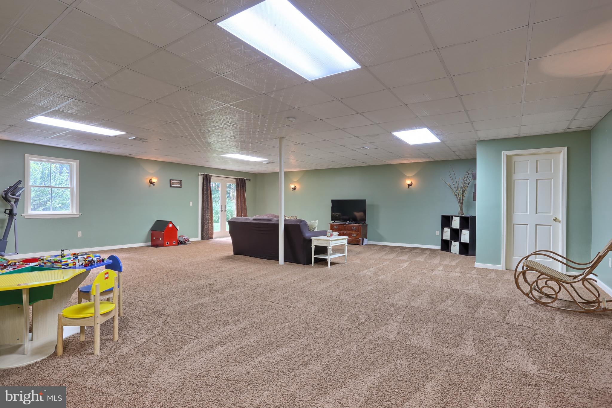 655 Forest Road Denver, PA 17517 - Photo 7 of 66 30 x 33 Finished walk out basement