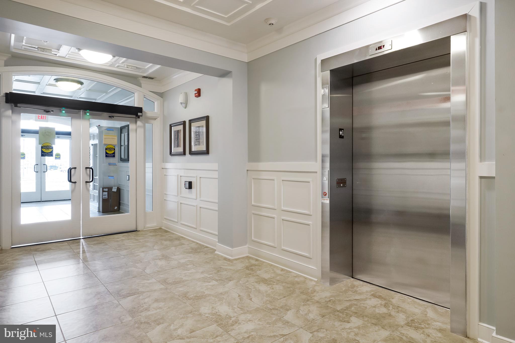 20650 Hope Spring Terrace, Unit 103 Ashburn, VA 20147 - Photo 5 of 30 a view of a hallway with closet and bathroom