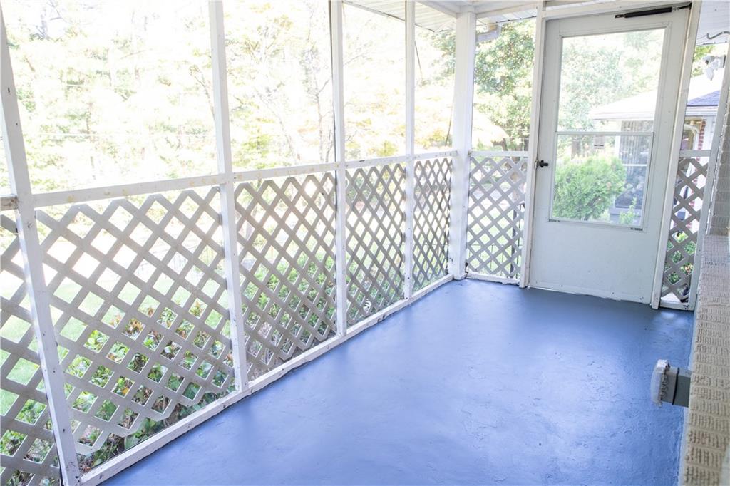 145 Holly Road Northwest Atlanta, GA 30314 - Photo 6 of 28 a view of a black and white floor to ceiling window