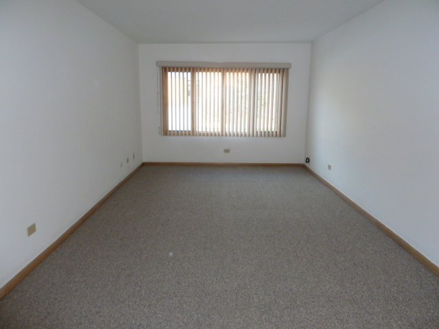 7922 South Pulaski Road Chicago, IL 60652 - Photo 58 of 96 an empty room with windows