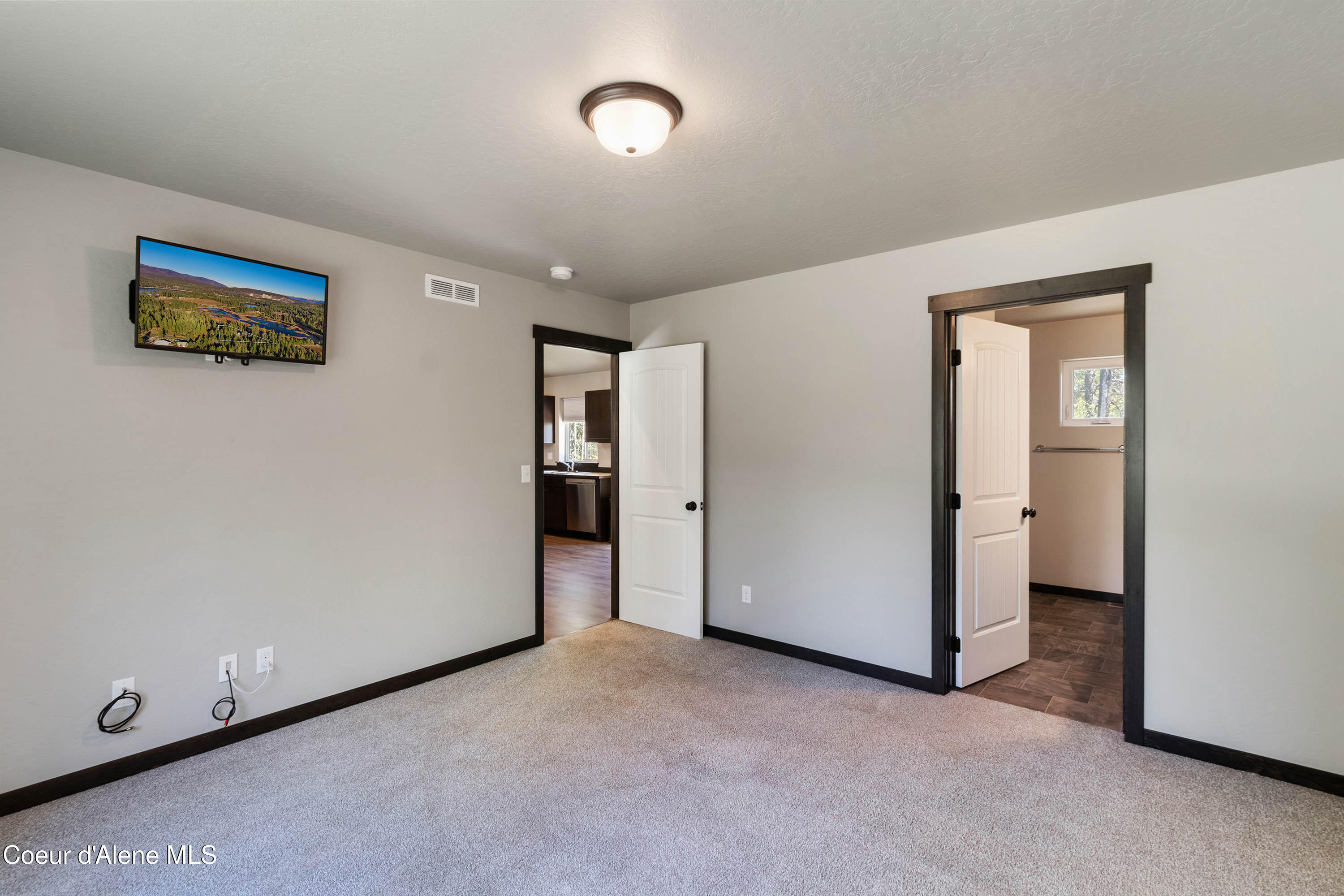 1279 Gypsy Bay Road Sagle, ID 83860 - Photo 13 of 37 Master Bedroom to EnSuite