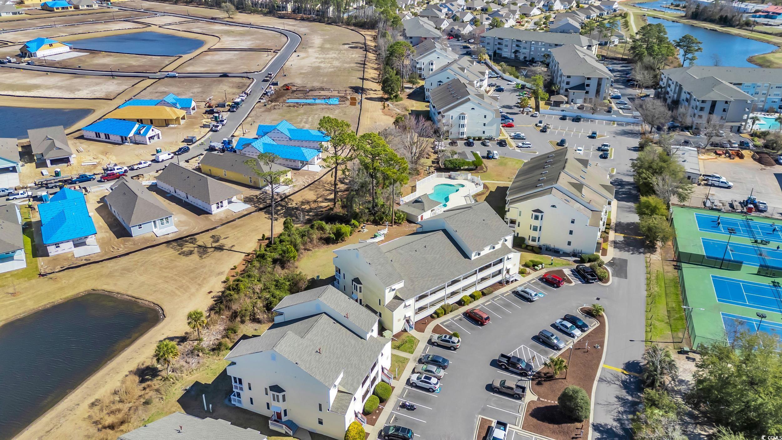 1100 Possum Trot Road, Unit C202 North Myrtle Beach, SC 29582 - Photo 25 of 34 Birds eye view of property with a water view and a