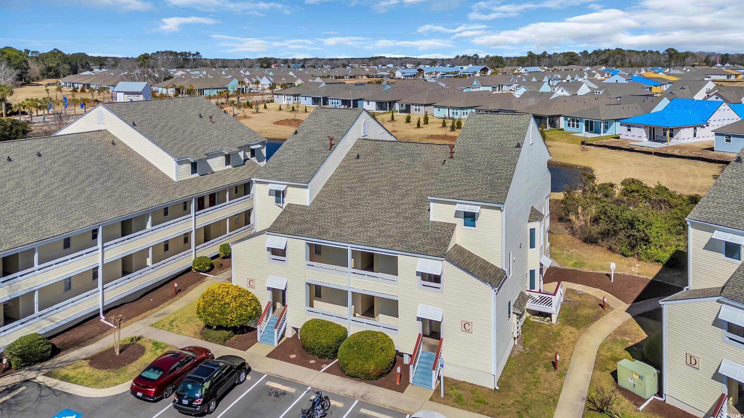 1100 Possum Trot Road, Unit C202 North Myrtle Beach, SC 29582 - Photo 33 of 34 Drone / aerial view featuring a residential view
