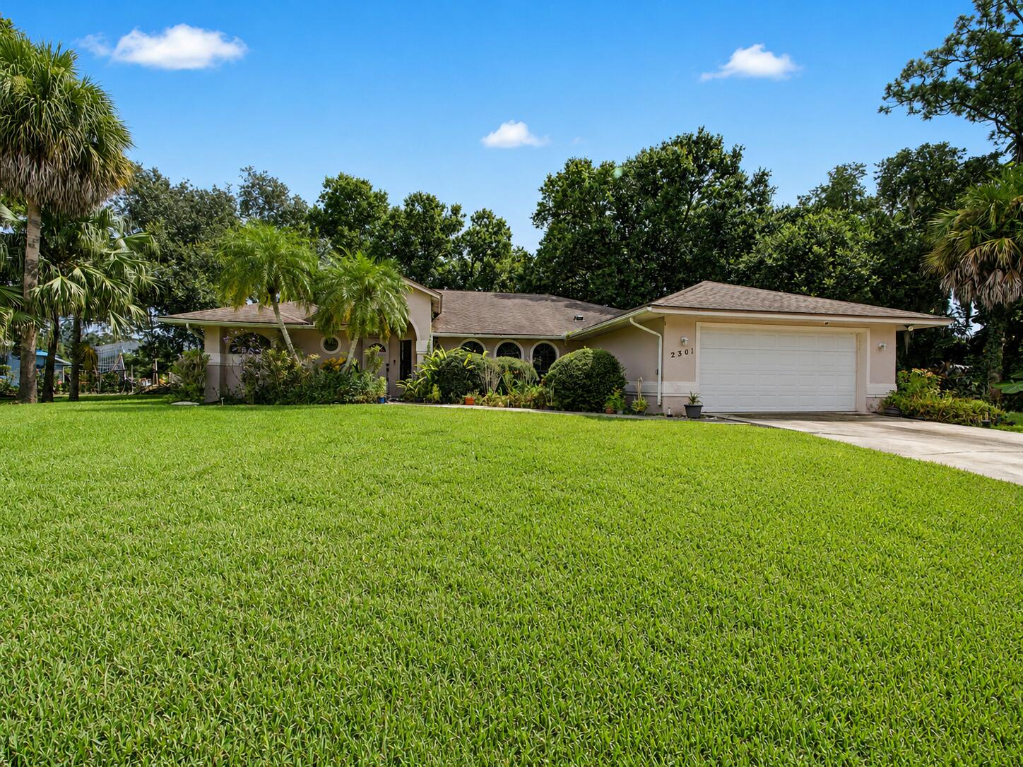 2301 Southwest Abner Road Port St. Lucie, FL 34953 - Photo 1 of 18 Front
