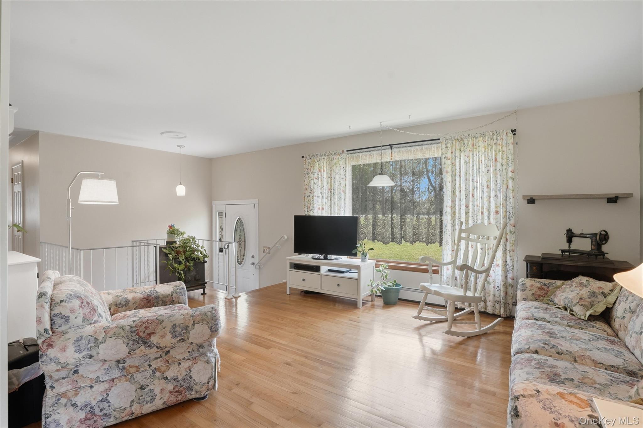 23 Old Cross Road Warwick, NY 10990 - Photo 7 of 34 Wood floors and large window in your spacious living room. Entertaining, friendly chats, or just relaxing ~ this space is perfect!