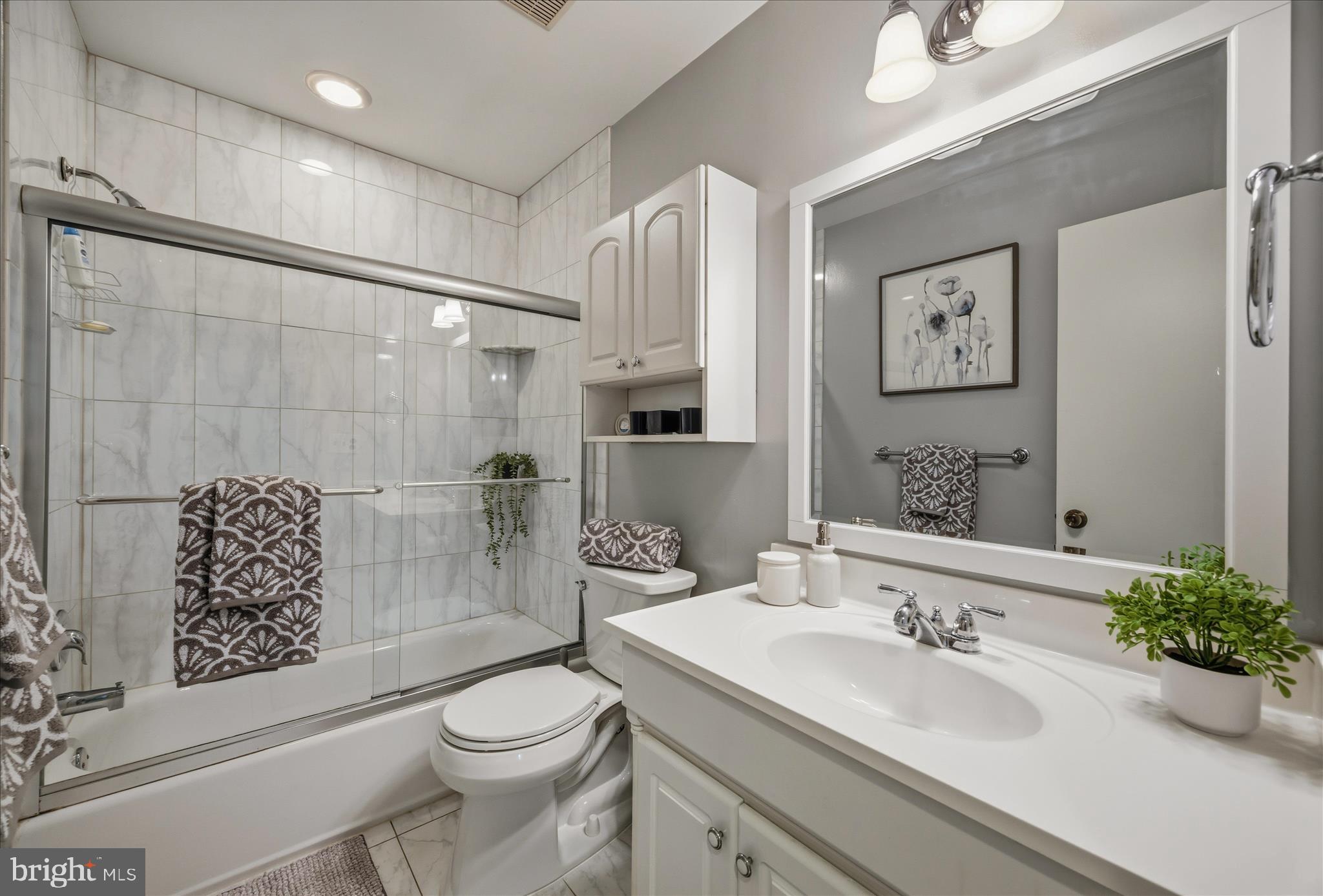 3204 Llewellyn Field Road Olney, MD 20832 - Photo 15 of 42 a bathroom with a sink toilet and shower
