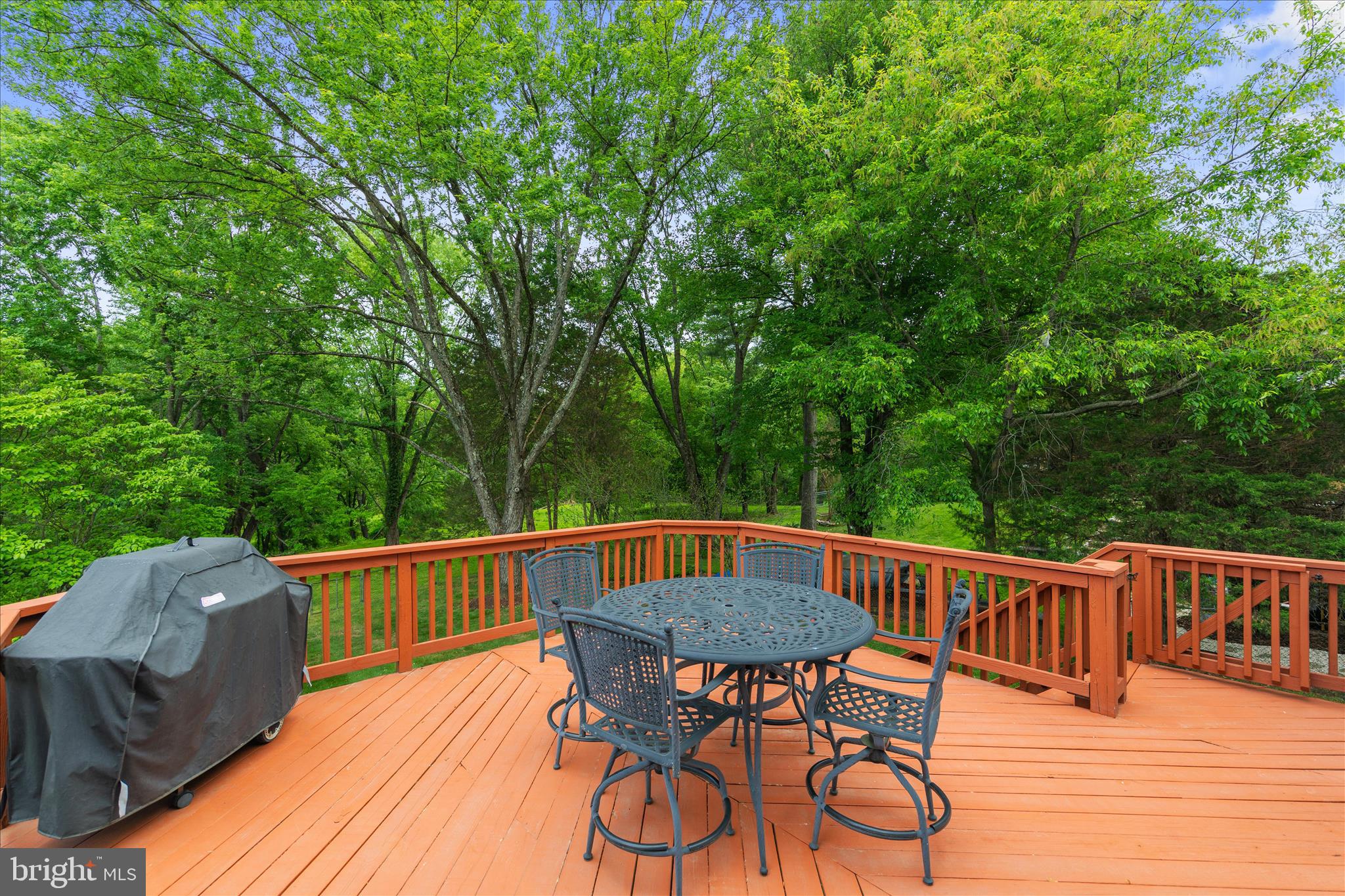 3204 Llewellyn Field Road Olney, MD 20832 - Photo 36 of 42 a view of balcony with furniture and trees