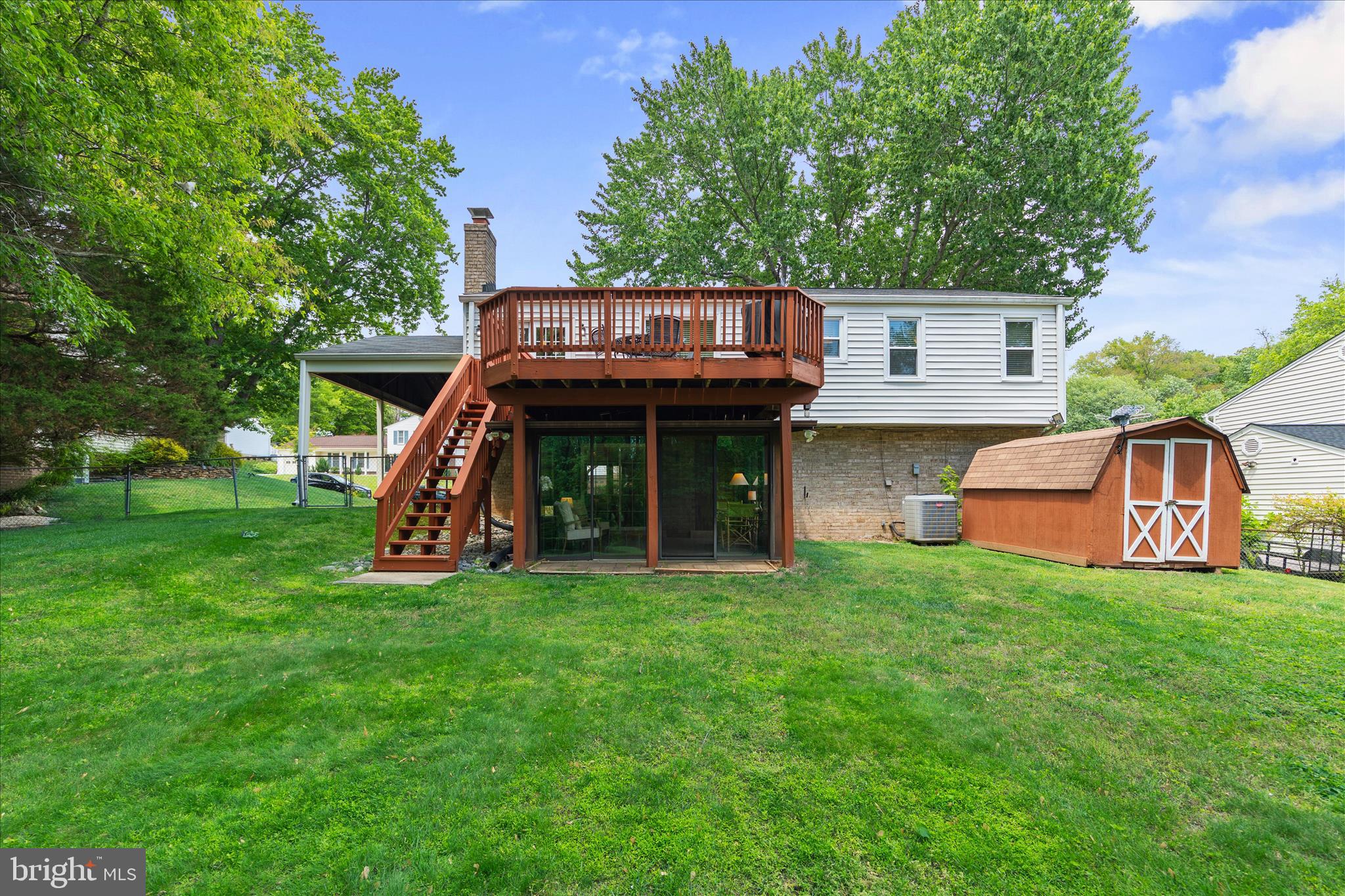 3204 Llewellyn Field Road Olney, MD 20832 - Photo 42 of 42 a view of an house with backyard space and deck