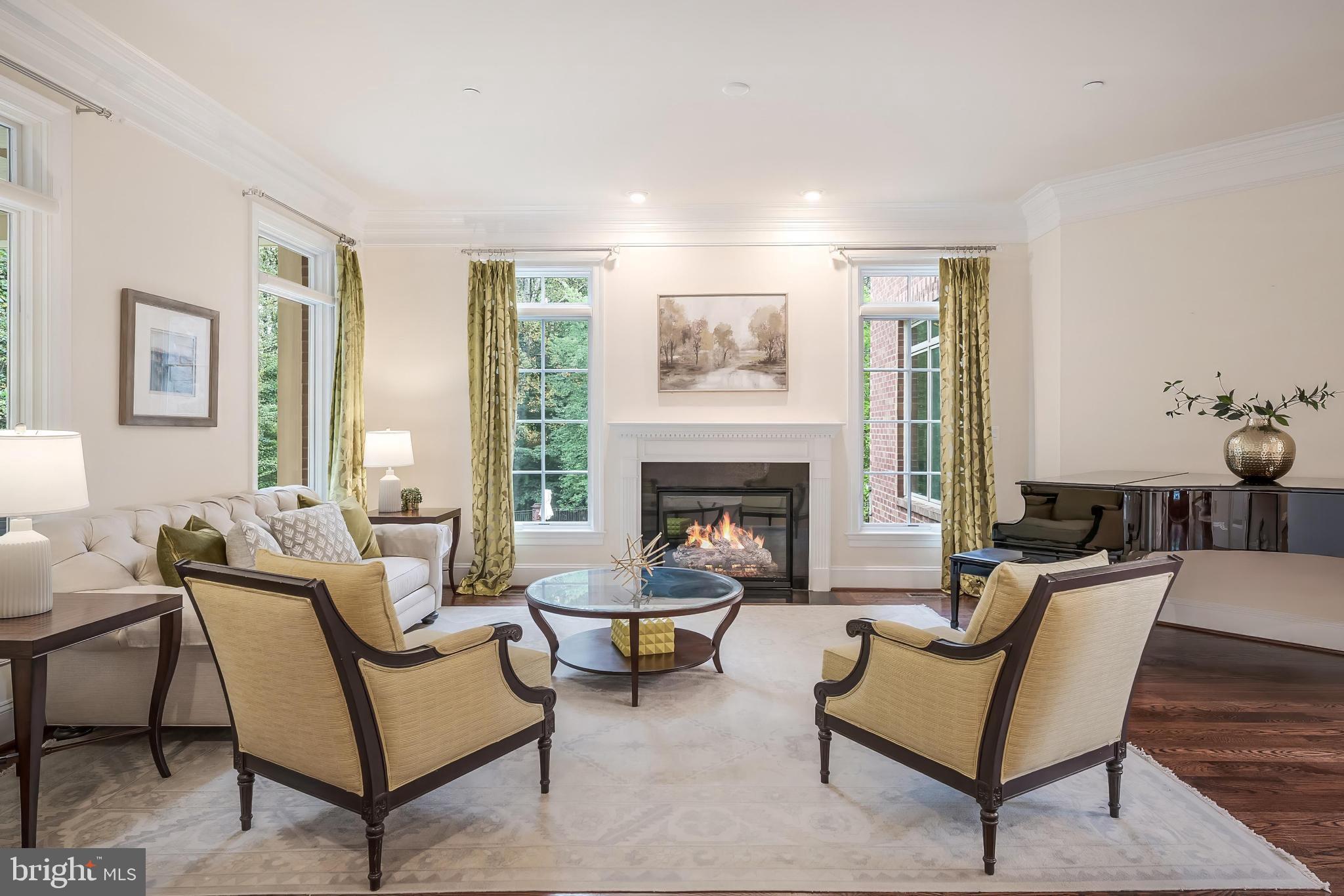 7020 Mountain Gate Drive Bethesda, MD 20817 - Photo 17 of 42 a living room with furniture and a fireplace