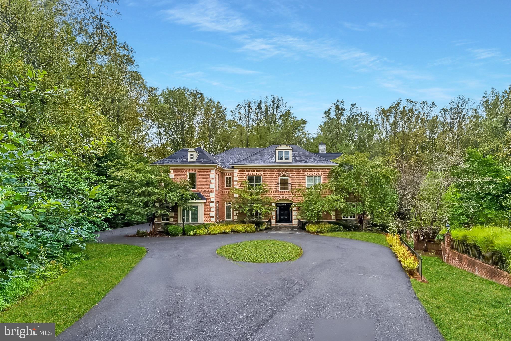 7020 Mountain Gate Drive Bethesda, MD 20817 - Photo 2 of 42 a view of a house with a yard