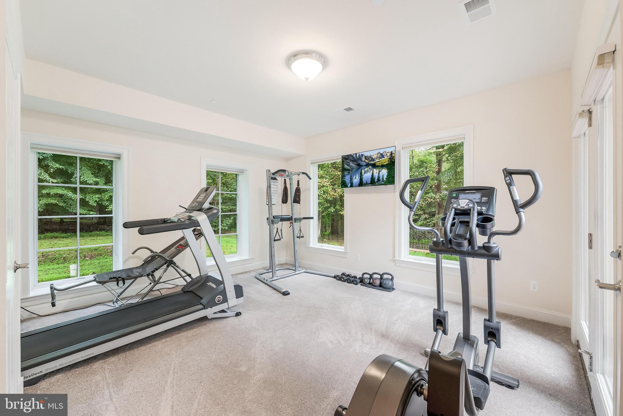 7020 Mountain Gate Drive Bethesda, MD 20817 - Photo 37 of 42 a view of a room with gym equipment