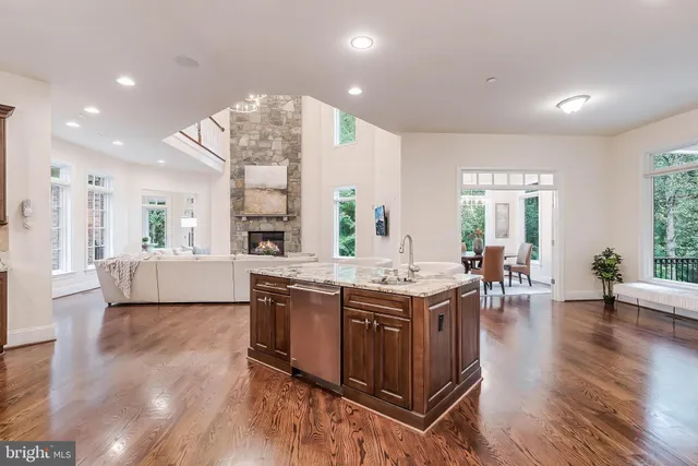 a view of a kitchen and dining room