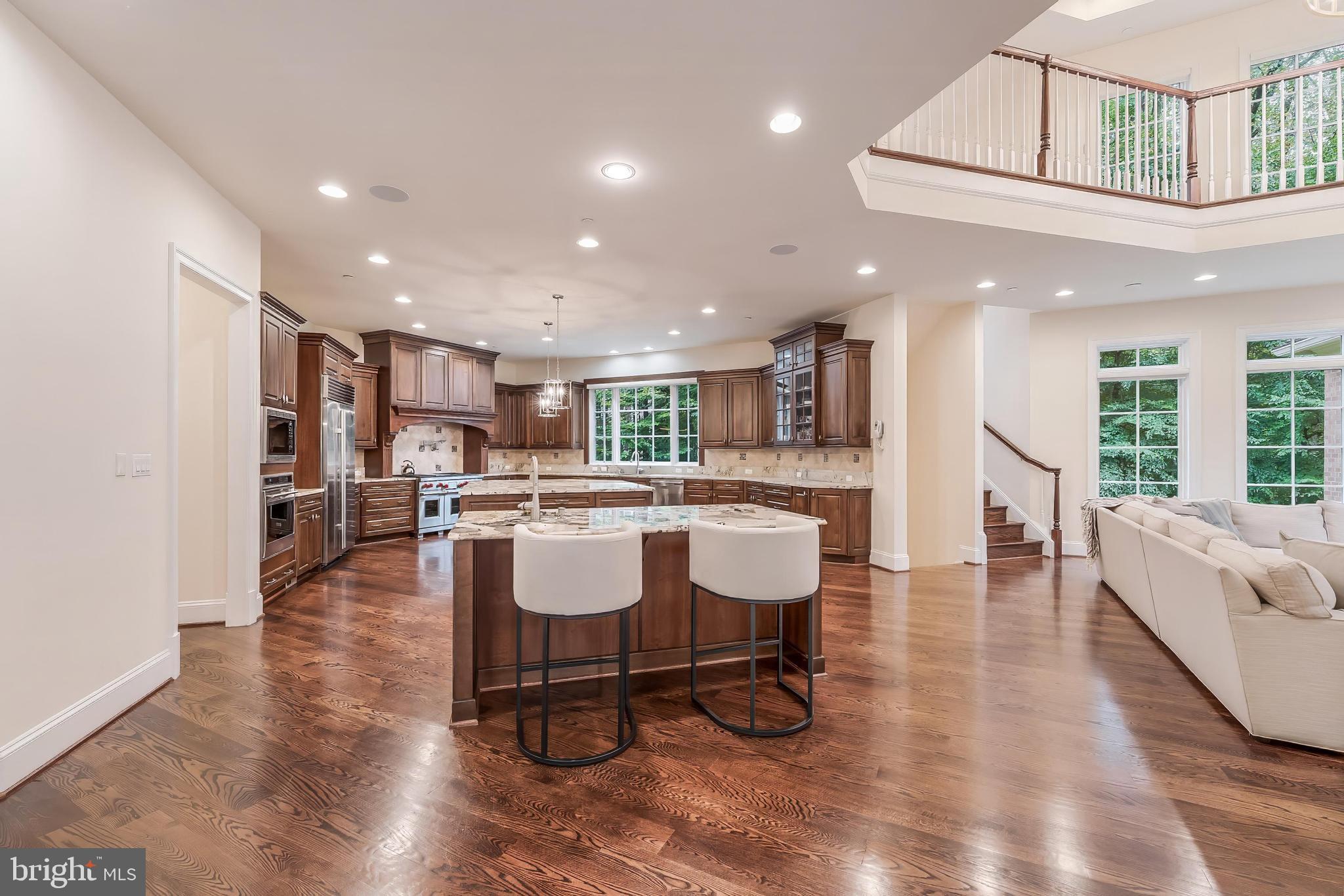 7020 Mountain Gate Drive Bethesda, MD 20817 - Photo 10 of 42 a living room with furniture and kitchen view